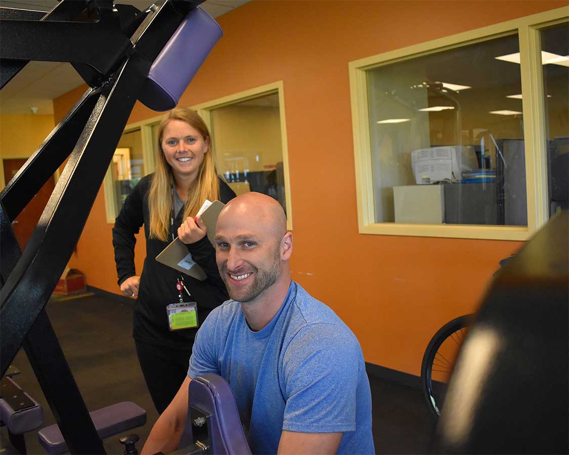 Experts working in gym Experts working in gym